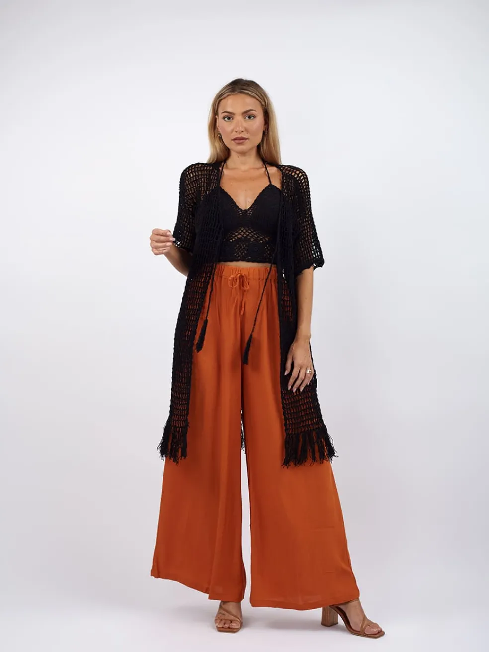 cardigan_con_frange_croch_1.webp Cardigan con frange Crochet Maria