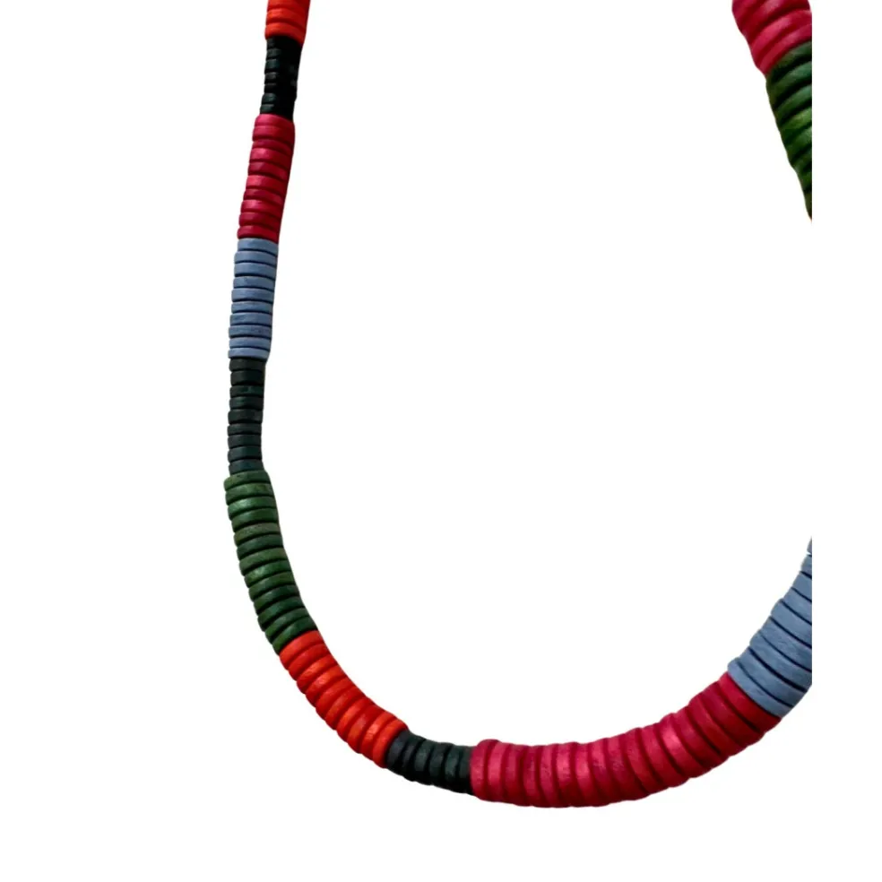 collana_lunga_unisex_legn_1.webp Collana lunga unisex, legno dischi Leo