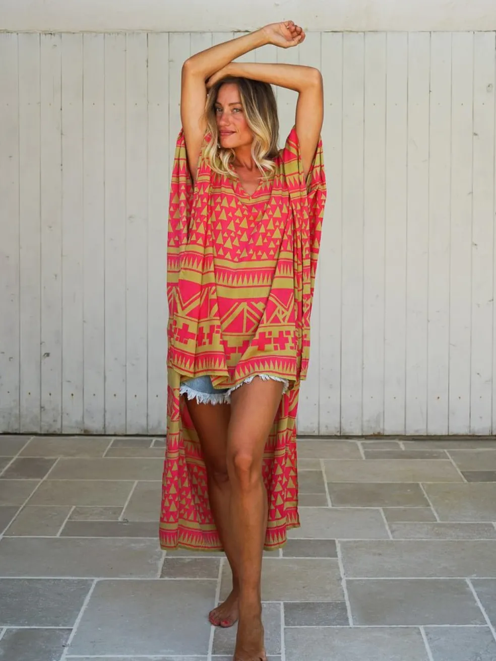 poncho_corto_davanti_lung_2.webp Poncho corto davanti lungo dietro rayon Lien